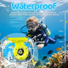 Boy in diving gear underwater holding a blue waterproof camera beside a depth scale