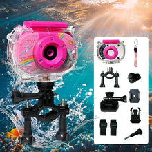 Pink camera with a rainbow design in a clear case on a handlebar mount with accessories laid out