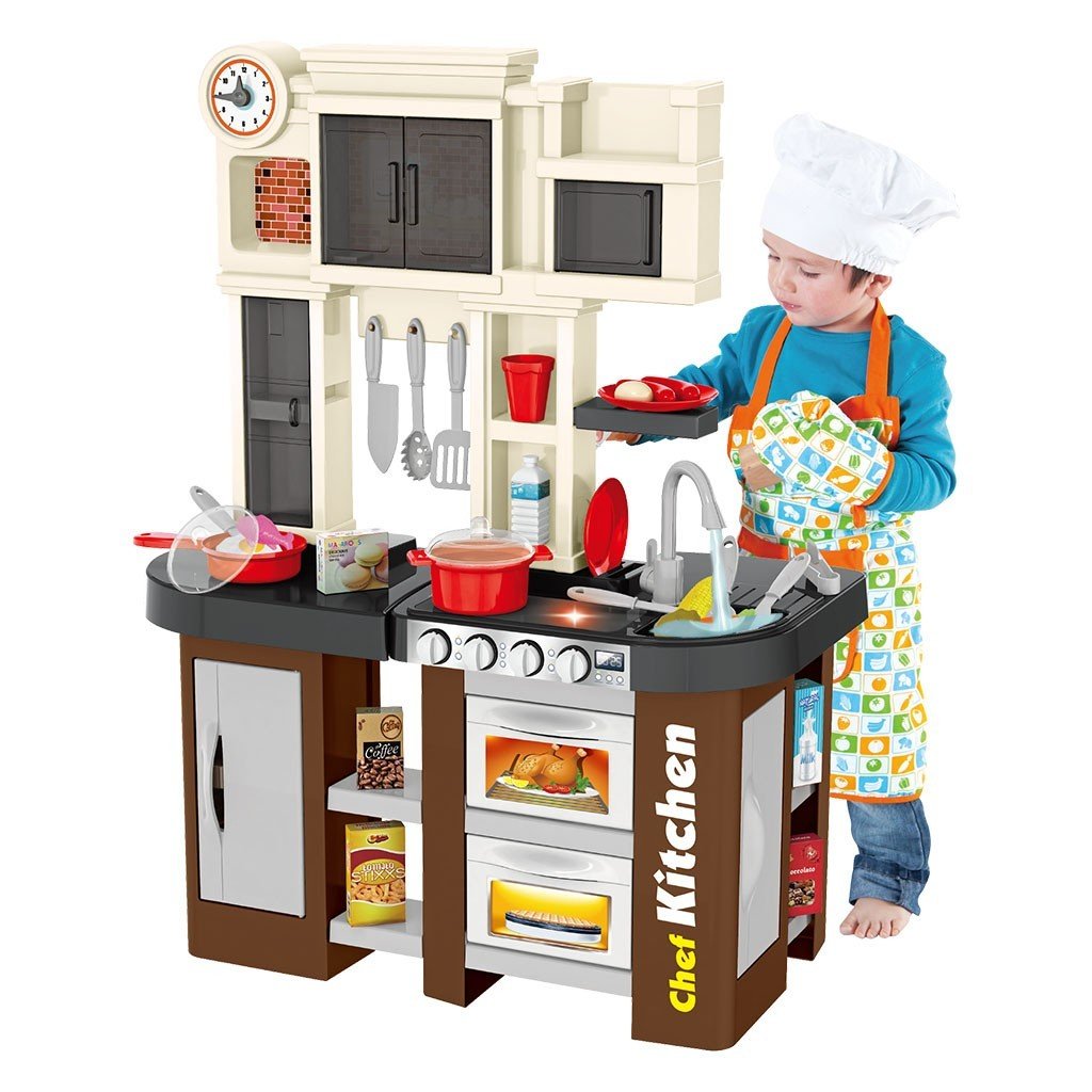 Child playing with a toy kitchen set.