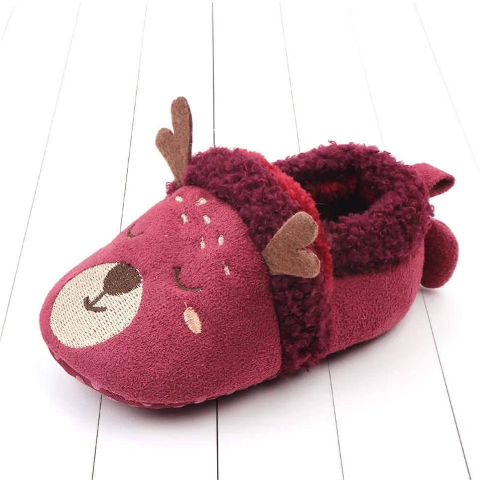 Ribbed ankle cuff pair of Knit Baby Slippers keeping baby feet covered during pram walks and car journeys.