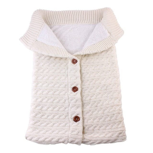 Knitted newborn sleep sack easy care fabric detail for repeat washing between night sleeps and naps.
