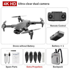 L900 Pro SE Drone set with remote control, battery, and spare parts for extended flying sessions.