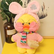 Cafe duck plush toy in a pink sweater and glasses for soft everyday play and pillow cuddling.