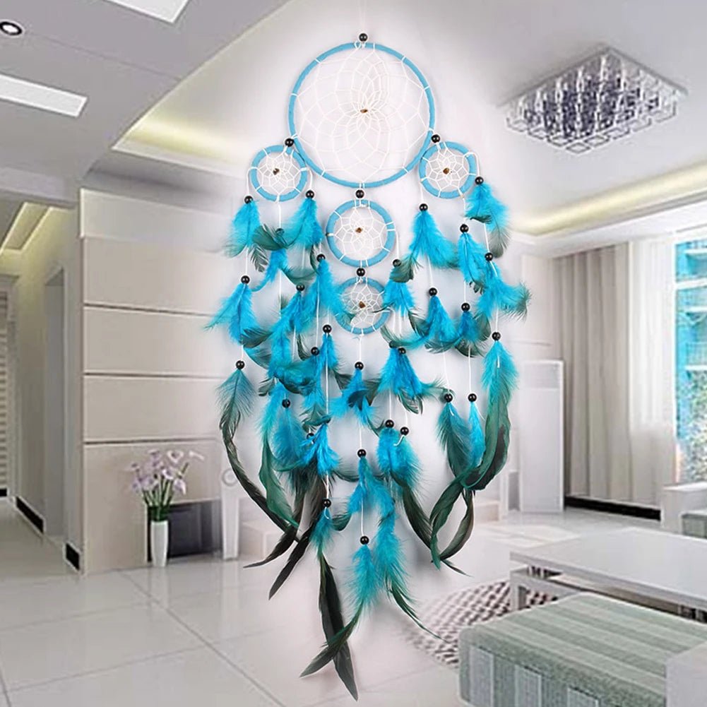 Large blue and white rattan hoop dream catcher displayed in a modern room setting.