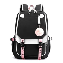 Large USB Canvas School Backpack in black and white styled for teen fashion wear.