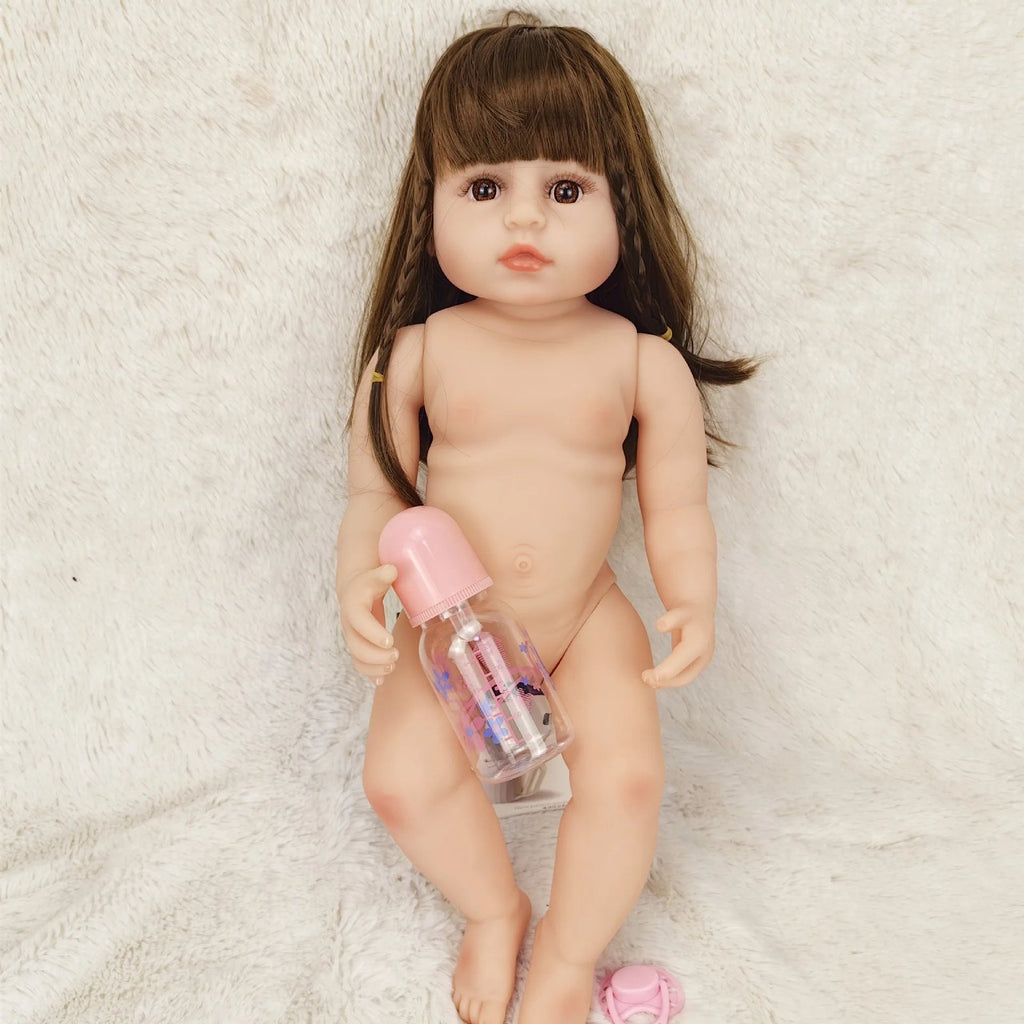 Lifelike Betty Princess full silicone Reborn Doll body view with a pink bottle for bathing routines and hands-on care play.