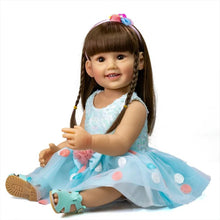 Lifelike Reborn Toddler Doll in a blue polka dot skirt with braided hair, a soft silicone body doll for cuddling and pretend play.