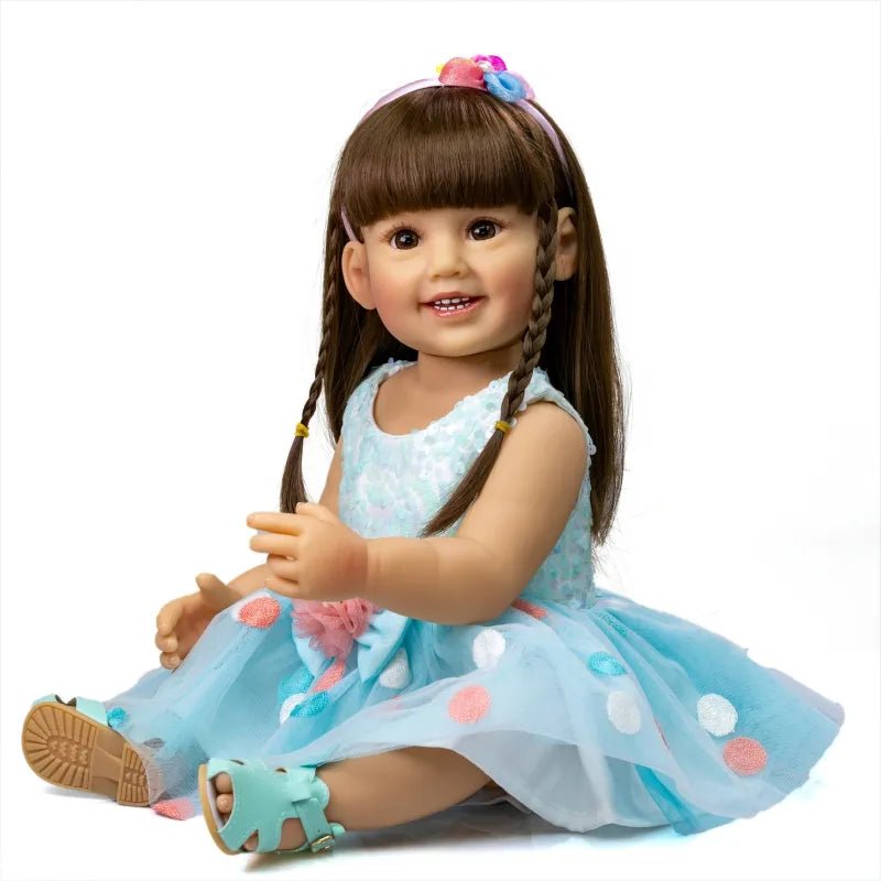 Lifelike Reborn Toddler Doll in a blue polka dot skirt with braided hair, a soft silicone body doll for cuddling and pretend play.