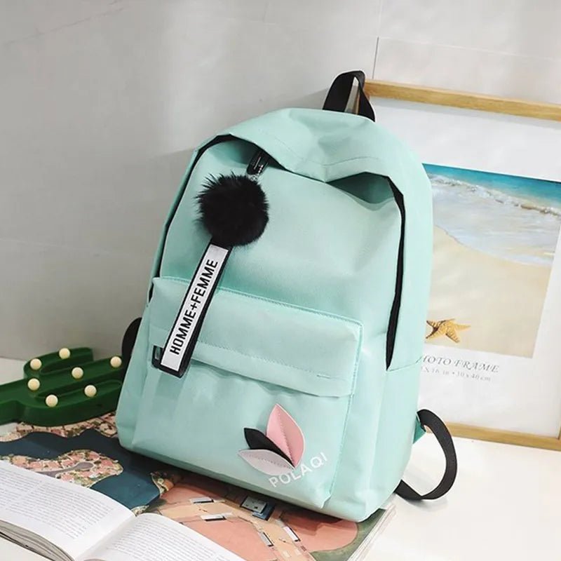 Light blue Kawaii Harajuku backpack styled in a bedroom setting for school carry and after-class outings.