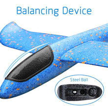 Blue and orange balancing device with a close-up of a steel ball
