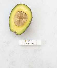 Lip Balm shown with avocado ingredient for soothing dry, chapped lips.