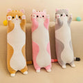 Long Cat Plush Toy shown in three colours as a soft nap pillow and stuffed animal doll.