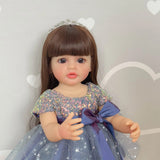 Doll with a blue dress and tiara 