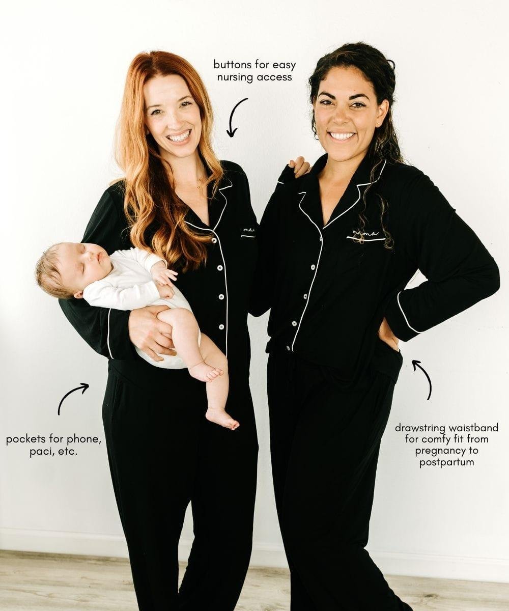 Two women wearing black pajamas with text.