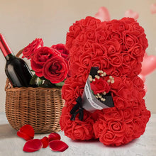 Luxury red Rose Bear styled with a rose basket and wine, a romantic flower teddy for anniversaries and date night gifts.