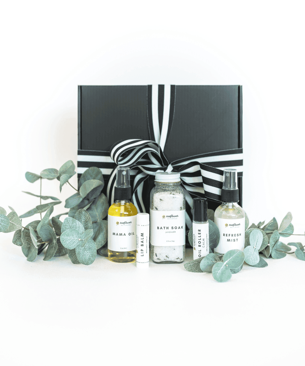 Luxury black self care gift box with a skincare set and eucalyptus for spa-style pampering and special occasion gifting.
