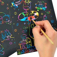 Magic Rainbow Scratch Art Card Set, scratch art paper with colorful designs and a hand holding a scratch tool, for creative color-reveal art activities.
