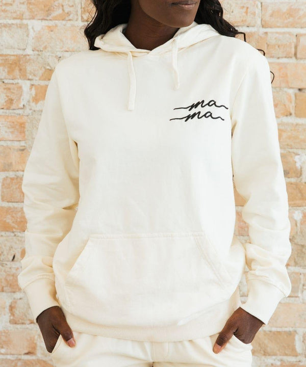 Person wearing a white hoodie with 'ma ma' text.