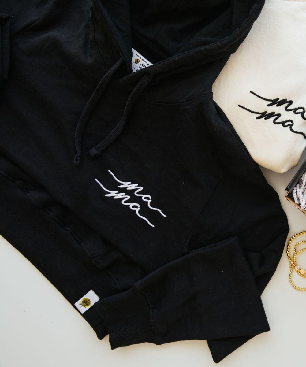 Black hoodie and shorts set with 'ma ma' embroidery.