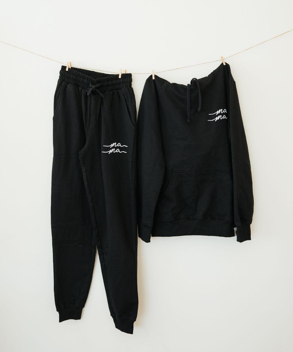 Black hoodie and logoed jogger pants.