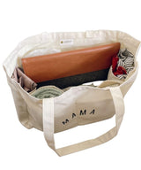 Beige tote bag labeled 'MAMA'.