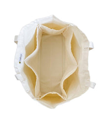 Beige bag.