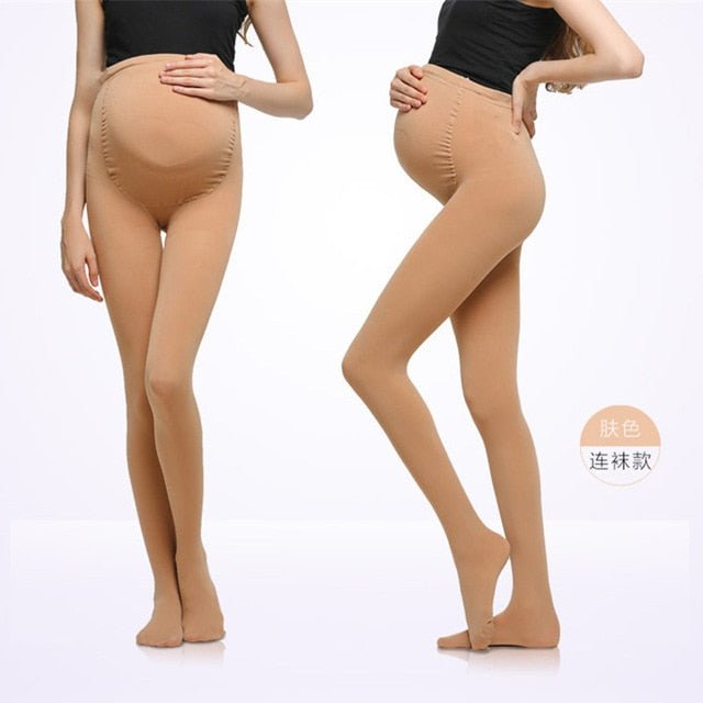 Maternity belly legging in beige styled for autumn outings and cooler-weather pregnancy wear.