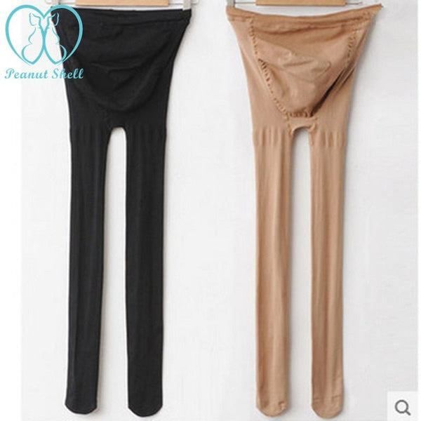 Maternity belly legging elastic strap tights in black and beige for autumn pregnancy wear.