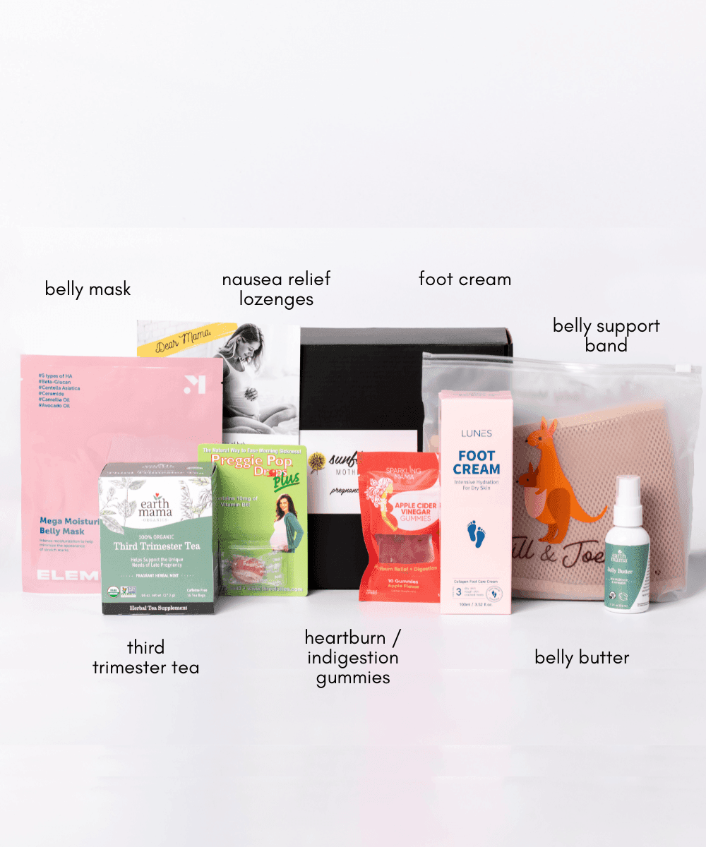 Pregnancy Box collection of maternity care products laid out for daily pregnancy skincare, comfort, and nausea relief.
