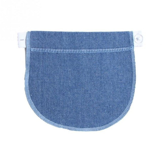 Maternity waistband extender in blue denim closeup for pregnancy pants waist expansion.