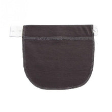Maternity waistband extender in dark gray fabric detail for pregnancy pants adjustment.