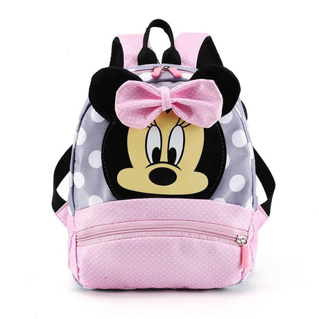Backpack with a cartoon character face and a pink bow