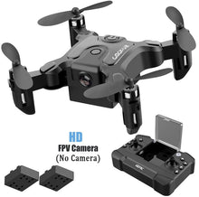 Black mini RC drone with HD FPV camera and controller for indoor beginner flight practice.
