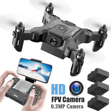 Mini RC drone with HD FPV camera paired with its remote control for beginner flying.