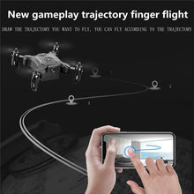 Mini RC drone controlled by smartphone app with trajectory flight for guided aerial paths.