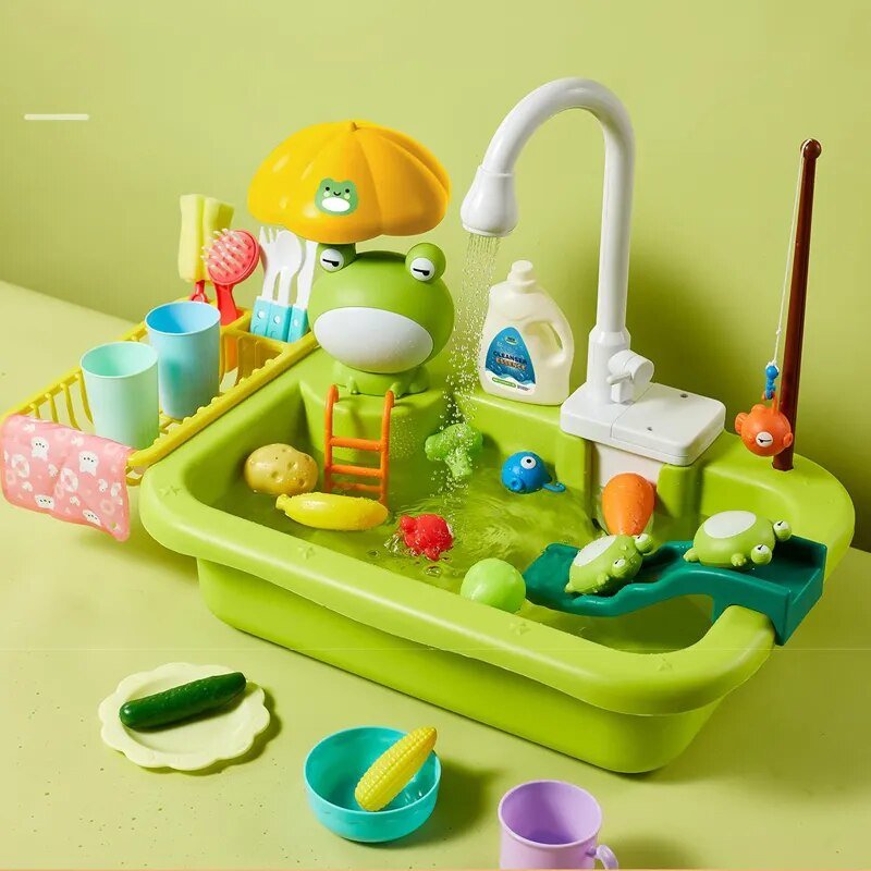 Children's toy kitchen set with a green sink, faucet, and various accessories 