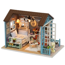 Wooden miniature room box dollhouse kit interior showing furniture placement for DIY hobby crafting.