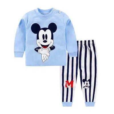 Children's outfit with a blue top and striped pants featuring a cartoon character