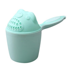 Mint green cartoon bear baby bath cup for gentle water pouring during newborn bath time.