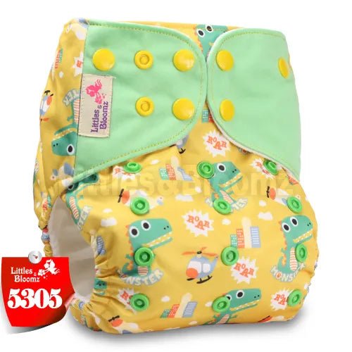 Yellow diaper with green frog pattern 