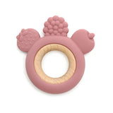 Pink silicone teething ring with textured surface