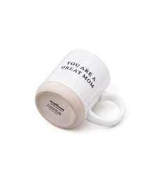 White mug with 'YOU ARE A GREAT MOM' text.