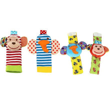 Monkey character baby rattle and foot finder socks playtime set for babies aged 0 to 12 months exploring movement.
