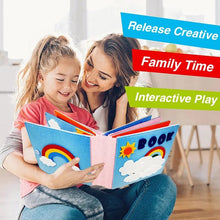 Parent and child reading the Montessori busy board book together for interactive family playtime.