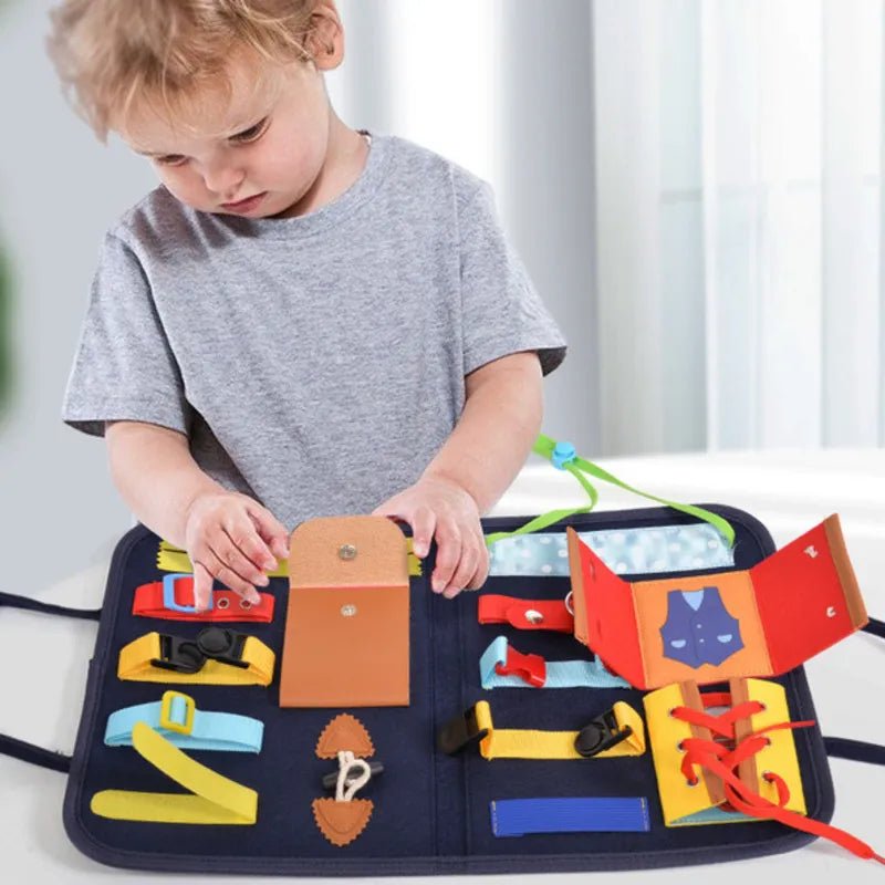Montessori Busy Board fine motor skills toy for toddlers practicing daily hands-on learning activities.