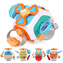 Orange and blue busy cube with a spinner and strap, shown with four other cube designs below