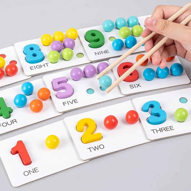 Educational number game with colorful balls and cards