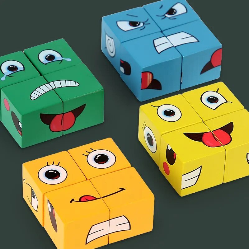 Four colorful cubes with cartoon face designs