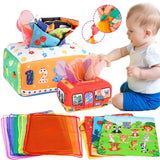 Baby playing with colorful educational toys and cloth books.