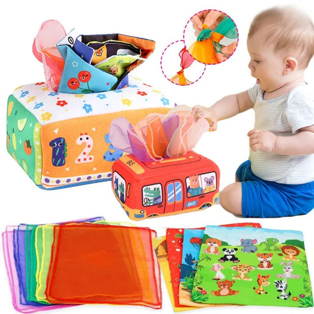 Baby playing with colorful educational toys and cloth books.